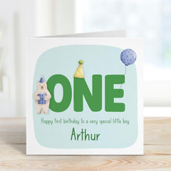 Personalised First Birthday Card for Baby Boy Name Bear and Balloon Design 1st Birthday Keepsake Card for Son Grandson or Nephew I am One
