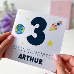Space Theme Birthday Card for a Special Son – Custom Name and Age – Rocket, Earth and Stars Design – Outer Space Celebration Keepsake