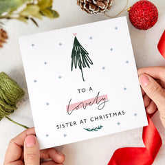 Christmas Card For Sister To A Lovely Sister At Christmas Card With Name Xmas Tree Card Christmas Gift Floral For Her Gift Card