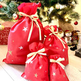 Drawstring red non woven gift bag with gold and silver stars, Durable and Re-usable