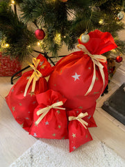 Drawstring red non woven gift bag with gold and silver stars, Durable and Re-usable