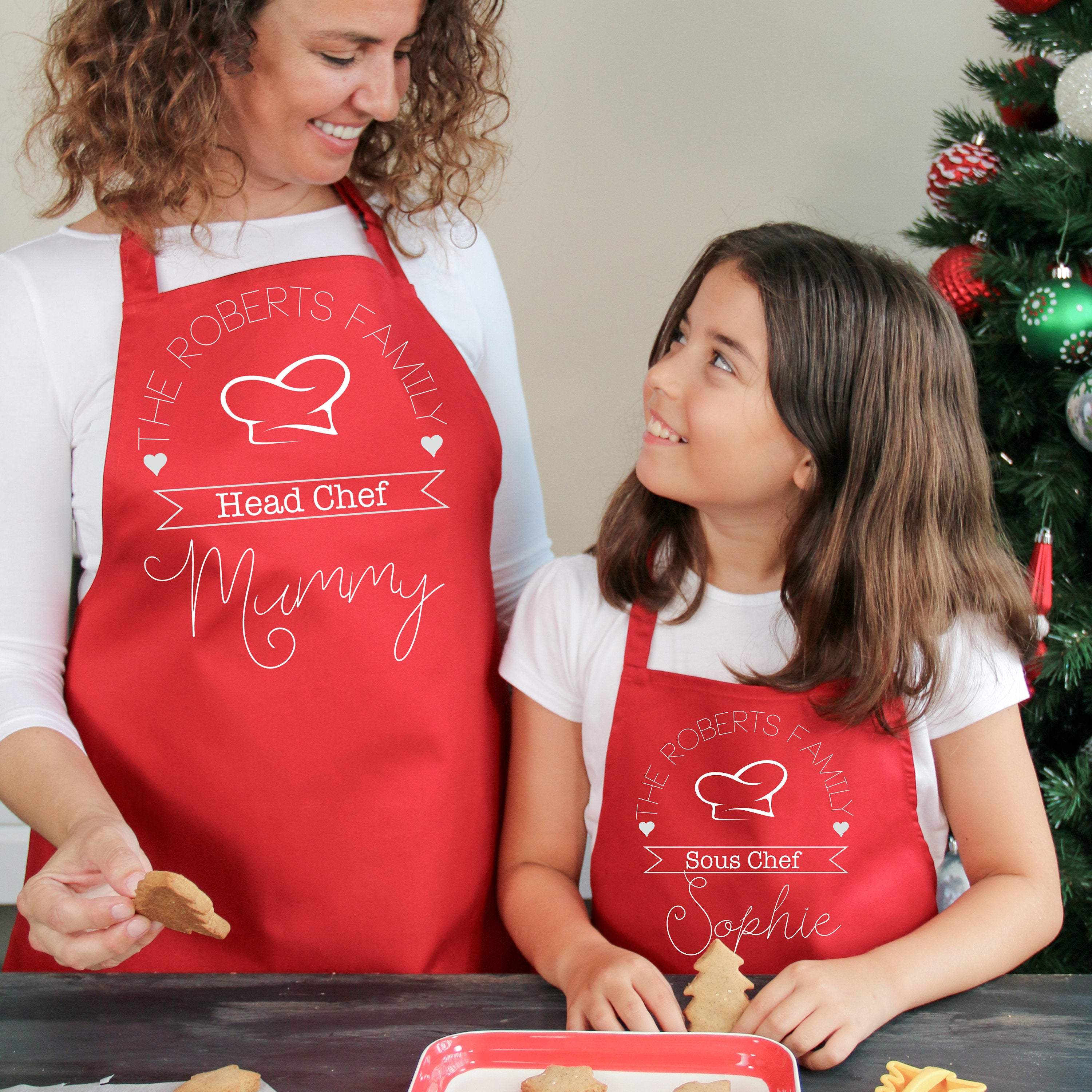 Matching head chef sous chef family aprons with names, Mum, dad, son and daughter aprons