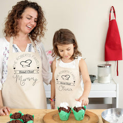 Matching head chef sous chef family aprons with names, Mum, dad, son and daughter aprons