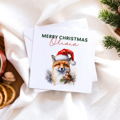 Personalised Merry Christmas Card with name, Fox and Robin with Santa Hat